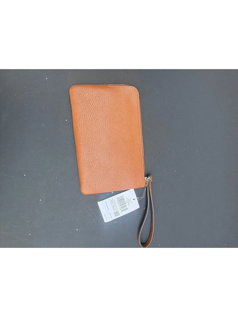 Kate Spade	NWT warm ginger pebble leather wristlet KB684
